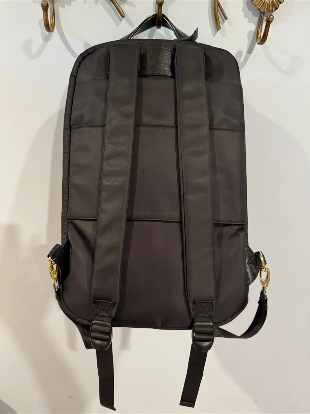 Allancia Peyton black nylon backpack featuring striking gold-tone hardware. NEW